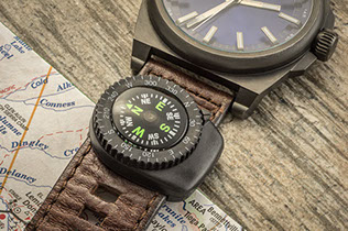 Wrist watch band compass camping outdoors recreation accessories product photograph photo